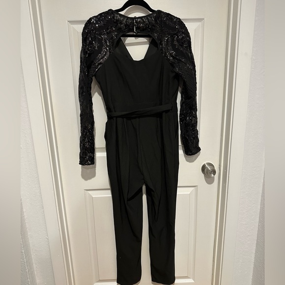 Little Mistress wrap front jumpsuit sequin sleeves. - Picture 9 of 11